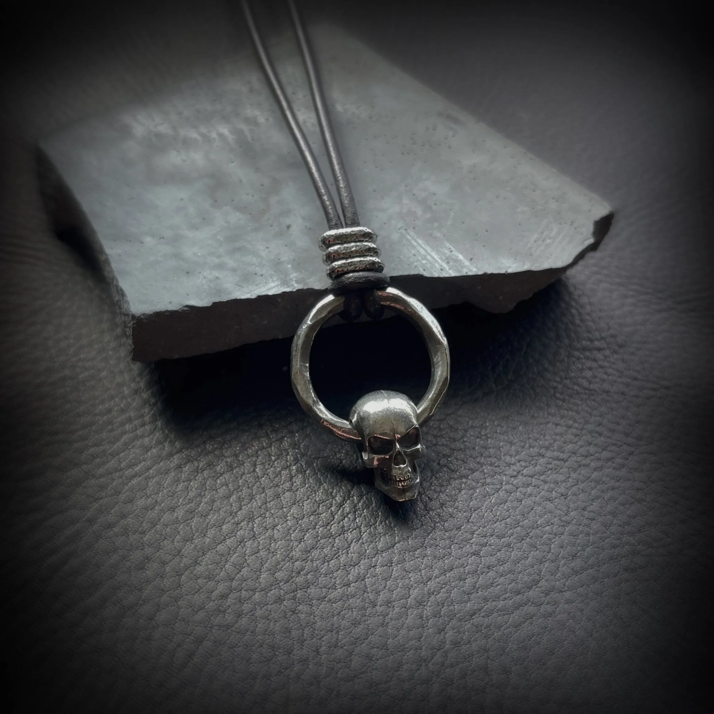 Draven Spinning Skull and Ring Pendant