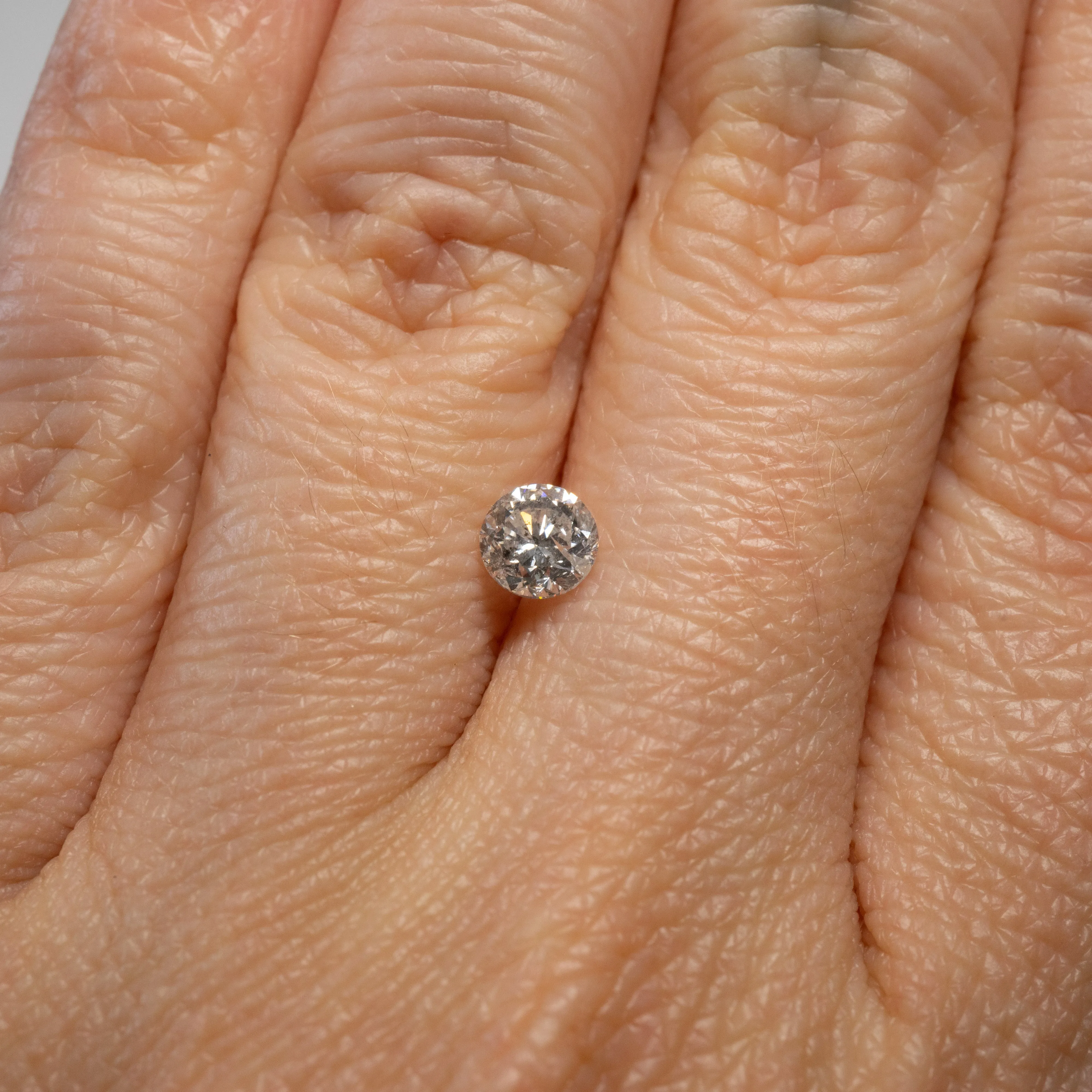Round Brilliant Salt   Pepper Diamond | 0.58ct | Canada Origin