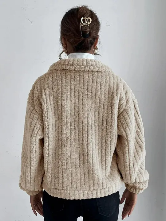 Short women's faux fur jacket for spring